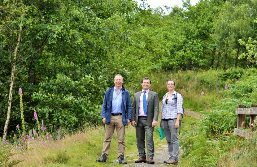 (Left to Right) Dr James Cooper, Head of Government Affairs at the Woodland Trust, Chris Green MP and Sara Wood, Regional Development Officer on the Smithills Estate