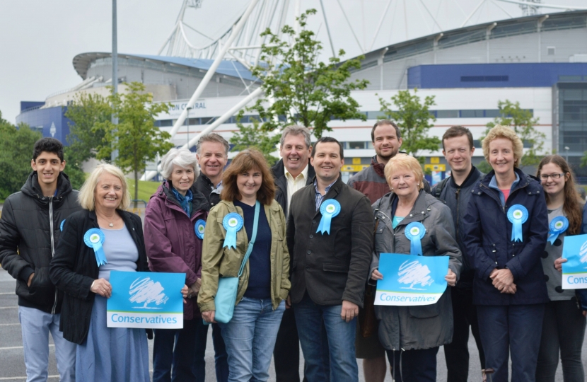 Chris & team outside the Macron Stadium