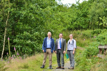 (Left to Right) Dr James Cooper, Head of Government Affairs at the Woodland Trust, Chris Green MP and Sara Wood, Regional Development Officer on the Smithills Estate